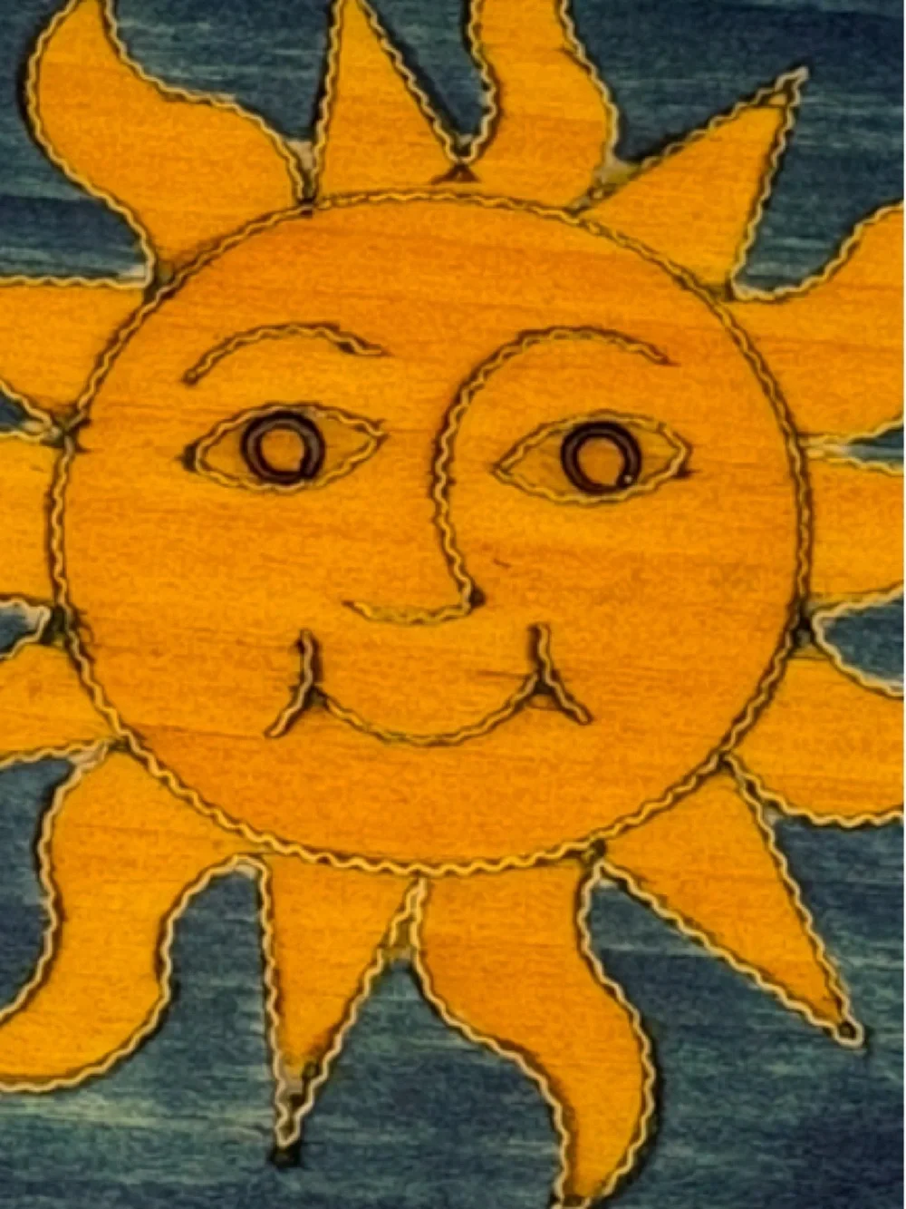 Bright Yellow Sun on Deep Blue Wooden Box